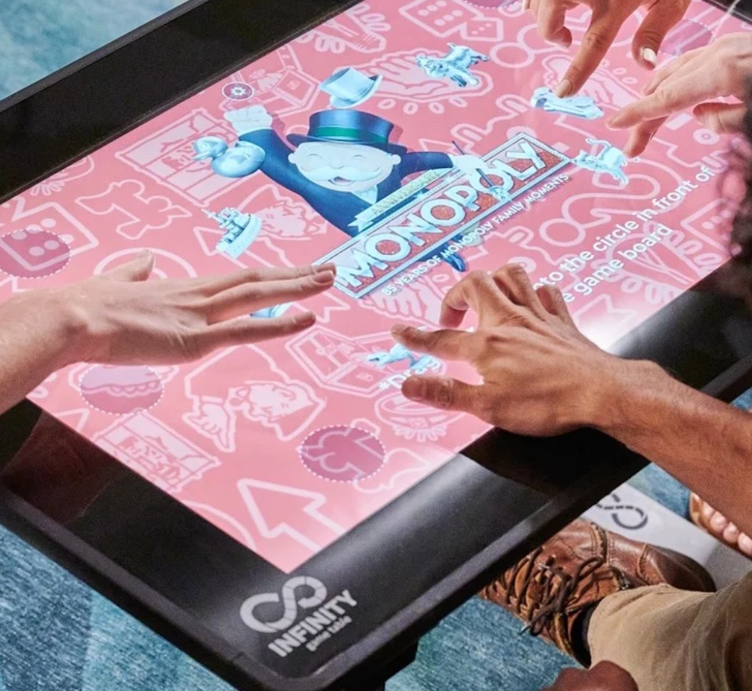 Arcade1Up Infinity Game Table features a high-resolution touchscreen